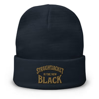 Navy cuffed beanie with Straightjacket Is the New Black embroidered artwork, front view
