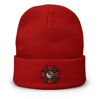 Red cuffed beanie with Yin Yang Wheel Cap embroidered artwork, front view