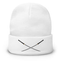 White cuffed beanie with Dual Samurai Swords Warrior embroidered artwork, front view
