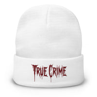 White cuffed beanie with Blood Drip True Crime embroidered artwork, front view