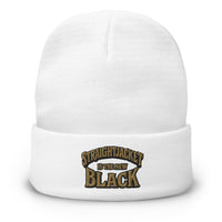 White cuffed beanie with Straightjacket Is the New Black embroidered artwork, front view