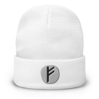 White cuffed beanie with Fehu Rune embroidered artwork, front view