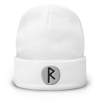 White cuffed beanie with Raidho Rune embroidered artwork, front view