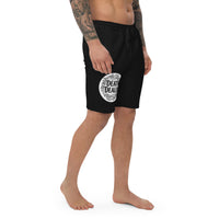 Death Dealer design on men's fleece shorts, right-front view