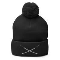 Black pom-pom beanie with Dual Samurai Swords Anime Warrior embroidered artwork, front view