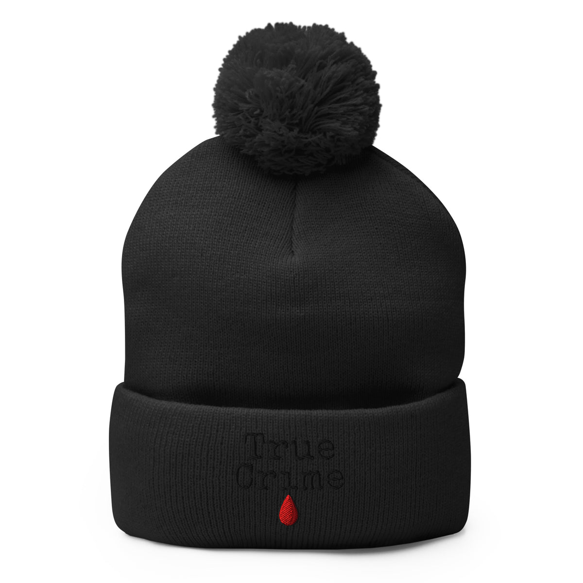 Black pom-pom beanie with True Crime Blood Drop embroidered artwork, front view