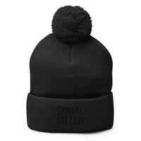 Black pom-pom beanie with Serial Killer True Crime embroidered artwork, front view