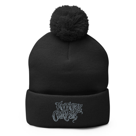 Black pom-pom beanie with Future Corpse embroidered artwork, front view