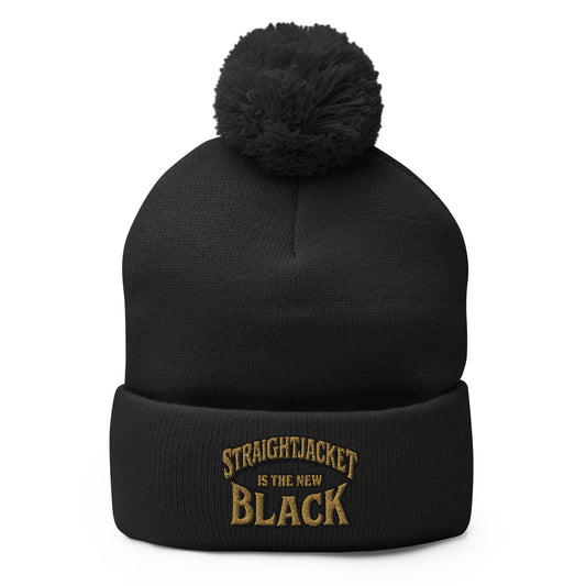 Black pom-pom beanie with Straightjacket Is the New Black embroidered artwork, front view