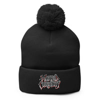 Black pom-pom beanie with Morbid Curiosity embroidered artwork, front view