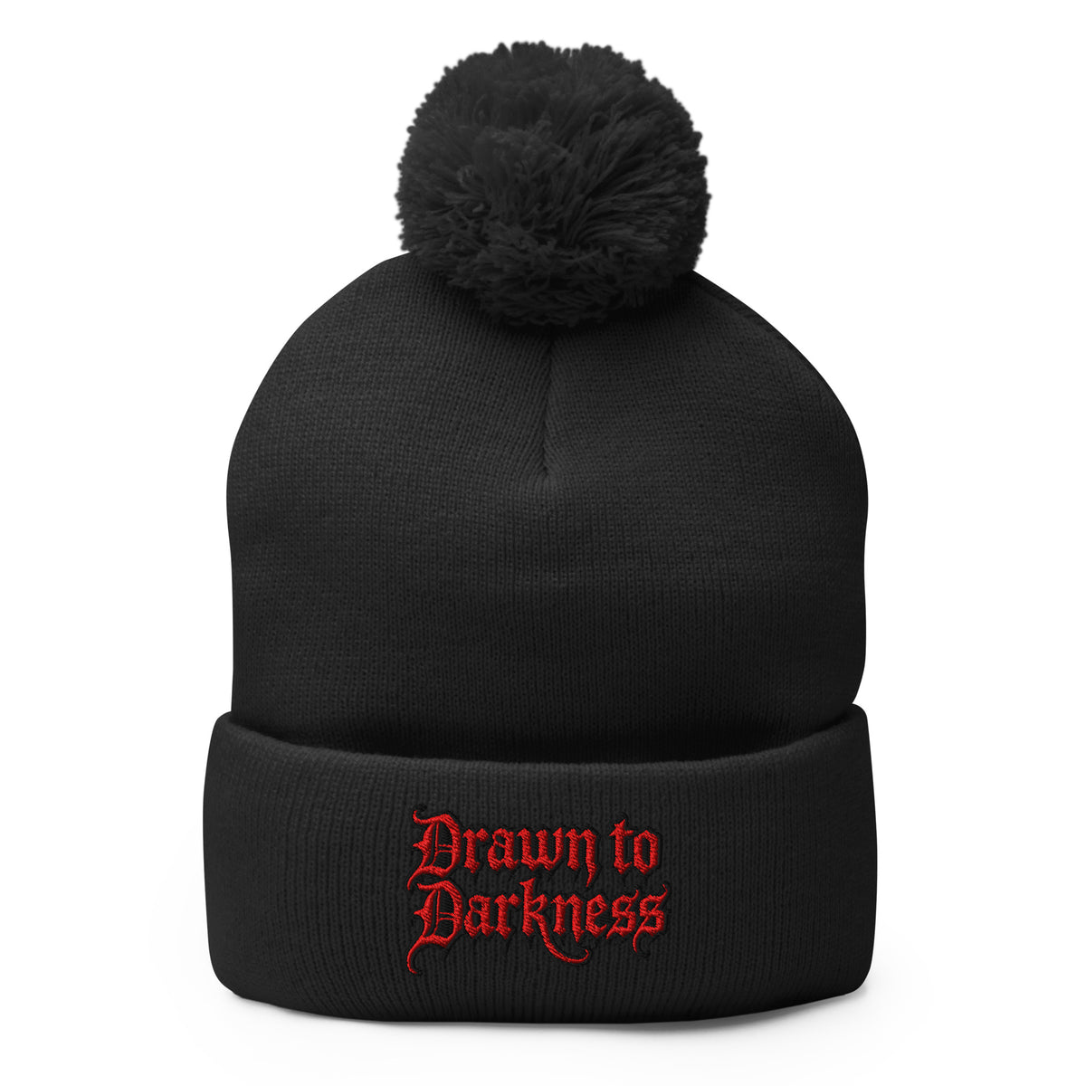 Black pom-pom beanie with Drawn to Darkness embroidered artwork, front view