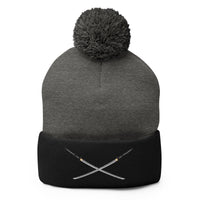 Black pom-pom beanie with Dual Samurai Swords Anime Warrior embroidered artwork, front view