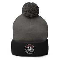 Black pom-pom beanie with Samurai Honor the Sword Japanese Kanji Symbol embroidered artwork, front view