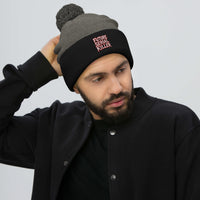 Black pom-pom beanie with Future Serial Killer embroidered artwork, front view