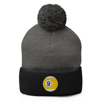 Black pom-pom beanie with Nine Ball Line Billiards embroidered artwork, front view
