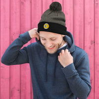Black pom-pom beanie with Nine Ball Line Billiards embroidered artwork, front view