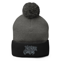 Black pom-pom beanie with Future Corpse embroidered artwork, front view