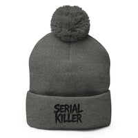 Gray pom-pom beanie with Serial Killer True Crime embroidered artwork, front view