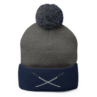 Navy pom-pom beanie with Dual Samurai Swords Anime Warrior embroidered artwork, front view