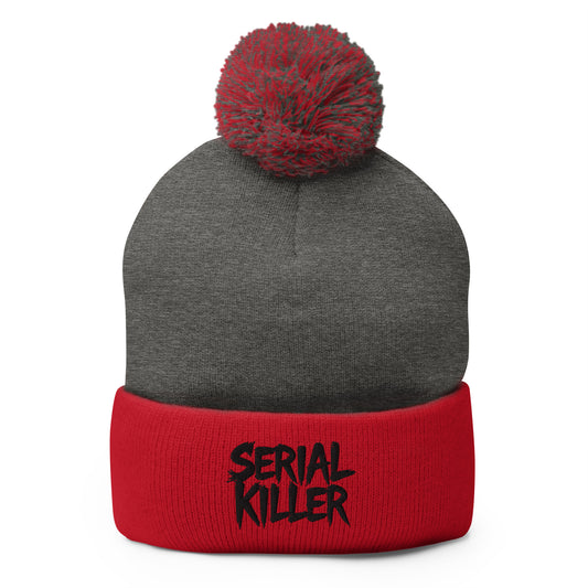 Red pom-pom beanie with Serial Killer True Crime embroidered artwork, front view