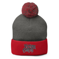 Red pom-pom beanie with Future Corpse embroidered artwork, front view
