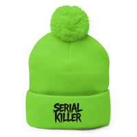 Green pom-pom beanie with Serial Killer True Crime embroidered artwork, front view