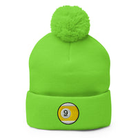 Green pom-pom beanie with Nine Ball Line Billiards embroidered artwork, front view