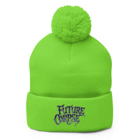Green pom-pom beanie with Future Corpse embroidered artwork, front view
