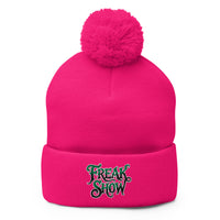pom-pom beanie with Freak Show embroidered artwork, front view