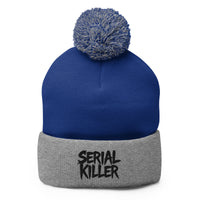 Gray pom-pom beanie with Serial Killer True Crime embroidered artwork, front view