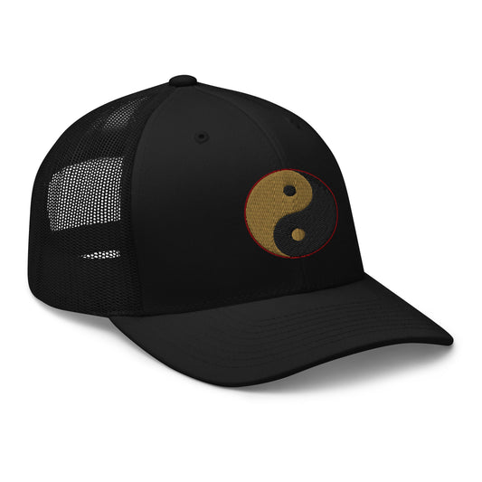 Black trucker hat featuring Yin Yang Gold Chinese Symbol embroidered artwork, product image 1