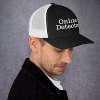 Black/ White trucker hat featuring Online Detective embroidered artwork, product image 2