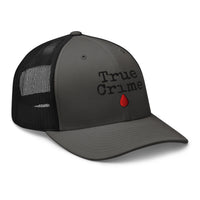 Black trucker hat featuring True Crime Blood Drop embroidered artwork, product image 1