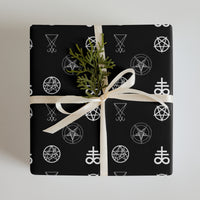 Demonology Occult Symbols pattern on wrapping paper sheets, front product mockup