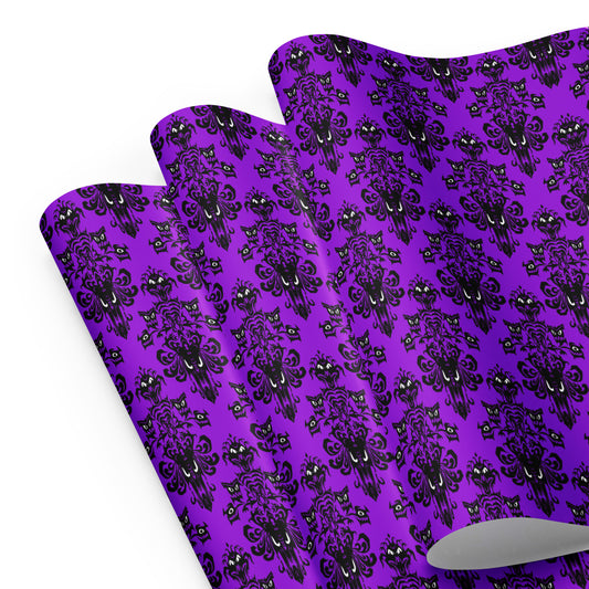 Purple Haunted Mansion pattern on wrapping paper sheets, front product mockup