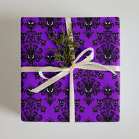 Purple Haunted Mansion pattern on wrapping paper sheets, front product mockup