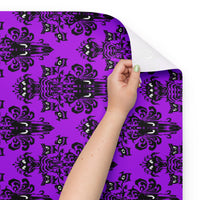 Purple Haunted Mansion pattern on wrapping paper sheets, front product mockup