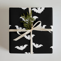 Vampire Bats pattern on wrapping paper sheets, front product mockup
