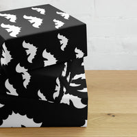 Vampire Bats pattern on wrapping paper sheets, front product mockup