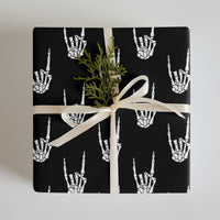 Devil Horns Bone Hand pattern on wrapping paper sheets, front product mockup