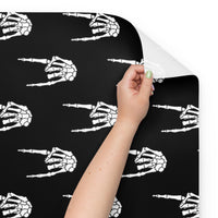 Devil Horns Bone Hand pattern on wrapping paper sheets, front product mockup