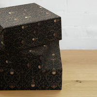 Skull Carnival pattern on wrapping paper sheets, front product mockup