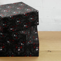 Skulls Roses & Ravens pattern on wrapping paper sheets, front product mockup