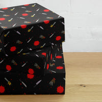 Classic Horror Weapons pattern on wrapping paper sheets, front product mockup