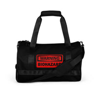Biohazard Warning artwork on black unisex duffle gym bag, front view