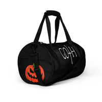 Goth Halloween Bat Pumpkin & Spider Web artwork on black unisex duffle gym bag, right-front view