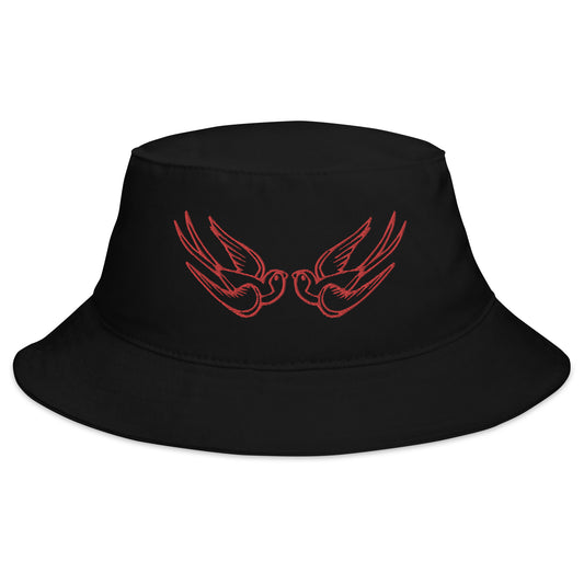 Black bucket hat with Red Falling Sparrows Tattoo Style Bird embroidered artwork, front view