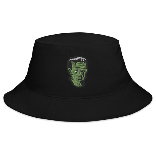 Black bucket hat with The Modern Prometheus Dr. Frankenstein's Monster embroidered artwork, front view