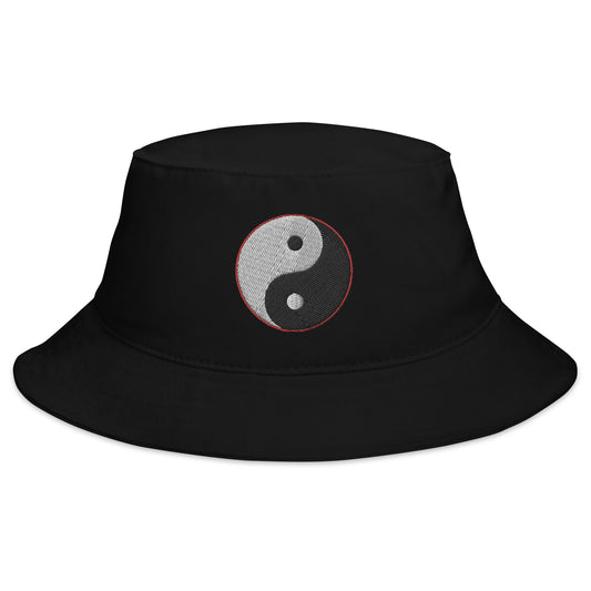Black bucket hat with Yin and Yang Chinese Symbol embroidered artwork, front view