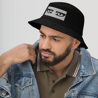 Black bucket hat with Goth Eyes Siouxsie and the Banshees embroidered artwork, left-front view